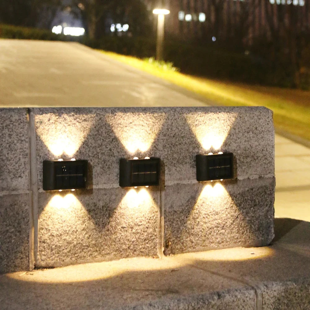 Lámpara Solar de pared para exteriores, luz cálida, impermeable, iluminación luminosa arriba y abajo, luces decorativas para balcón, patio y jardín, pared Exterior